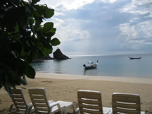 Longtail boats can bring visitors to Banana beach, Phuket. Longtail boats at the beach
