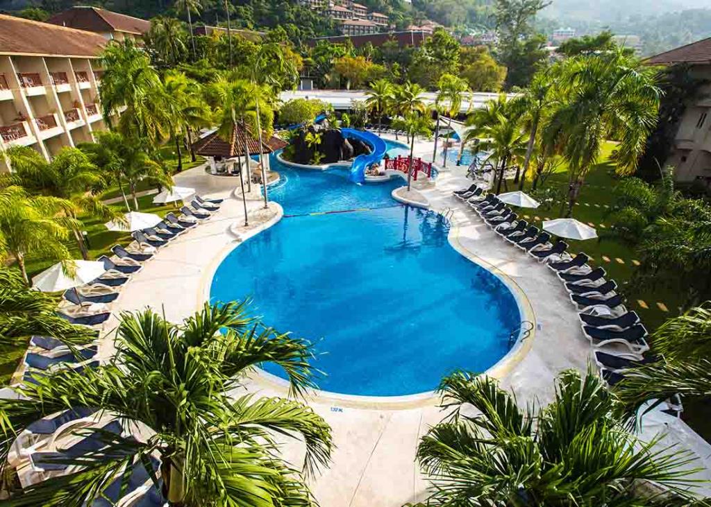 Swimming pool and slide at Centara Karon Resort Centara Karon Resort Phuket