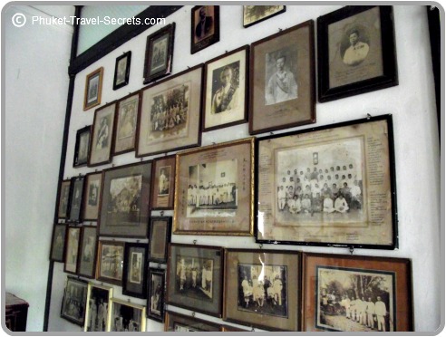 Old family photos line the walls of the mansion.