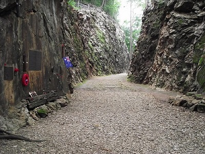 Memorial Plagues along the walls of the cuttings at Hellfire Pass