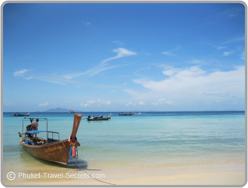 Longtail boats provide transport to nearby islands in Phuket, Krabi & Phi Ph