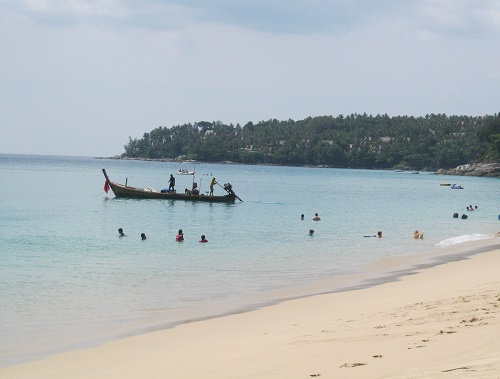 Explore the coastline at Surin Longtail boat