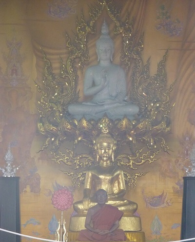 Buddha Images inside the main assembly hall at the White Temple, the picture was taken from outside looking in. Buddha Images inside the main assembly hall at the White Temple, the picture was taken from outside looking in.