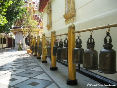 Bells surrounding the lower level at Wat Phra That