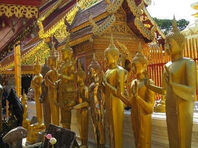 Golden Statues and Shrines are located around the Golden Chedi at Wat Prah That Doi Suthep.