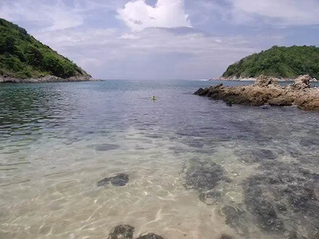 Snorkeling in the clear calm waters at Yanui Beach, Phuket. Snorkeling and Swimming at Yanui Beach